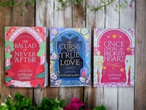 A Curse for True Love -Stephanie Garber Once Upon a Broken Heart -Stephanie Garber The Ballad of Never After - Stephanie Garber